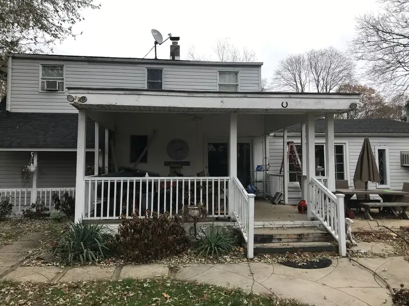 Back of a cape with a covered porch, Bay Shore, NY