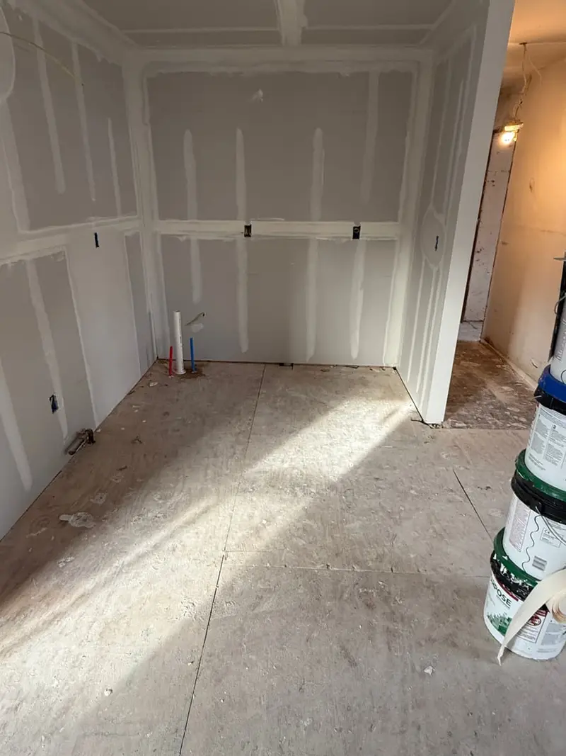 Fresh drywall taped in an empty room, Bay Shore, NY
